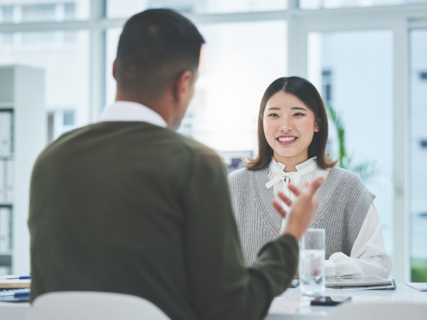 FullImage-858x643-iStock-1678143132 Two people having a meeting about potential recruitment opportunities.