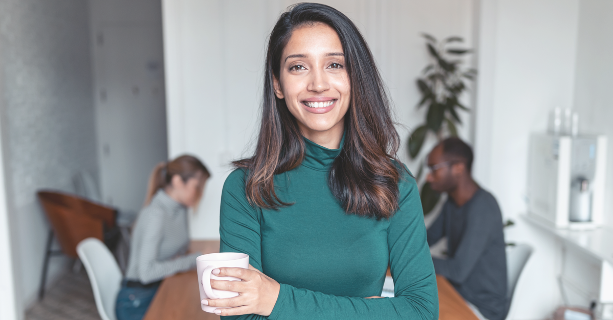 WorkwithUs-Featured Image Size -1200x628px Portrait of a happy confident young african american businessman standing with his arms crossed looking at camera.