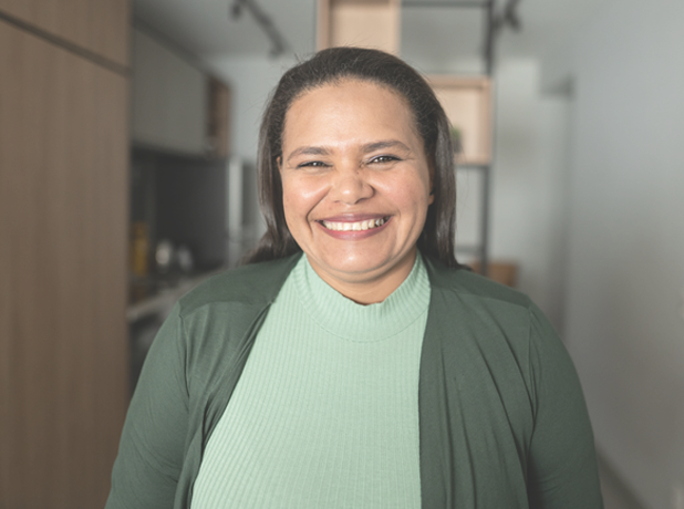 Media Text Split Module - 618x460px - 1 Lady looking at the camera and smiling.