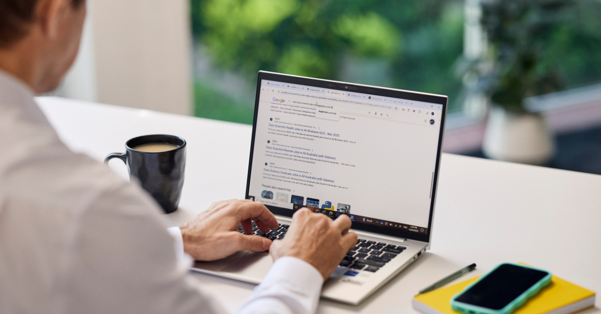 Man searching for jobs online on his laptop